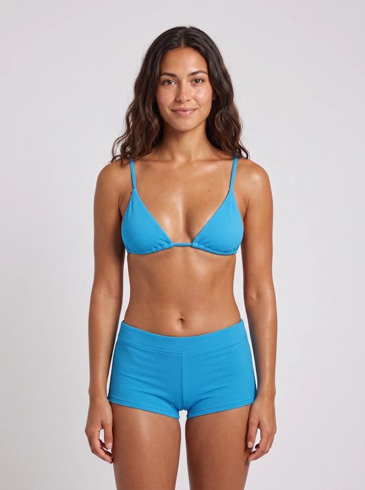 Shorty Cabine 9, porté vue face en studio, maillot de bain Palm Club